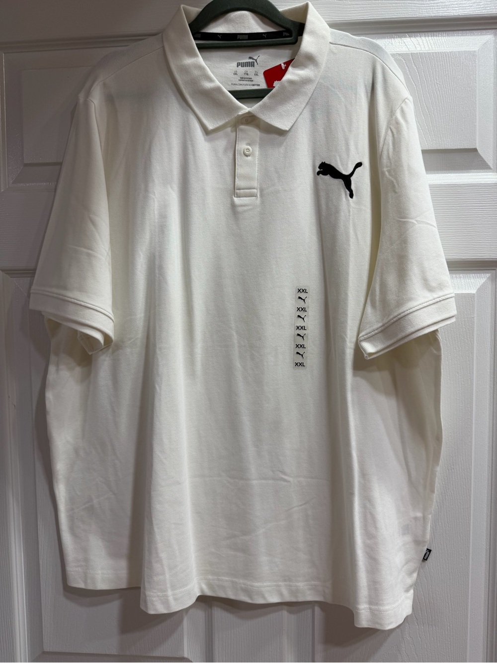 Puma White Polo Shirt with Black Puma Logo
